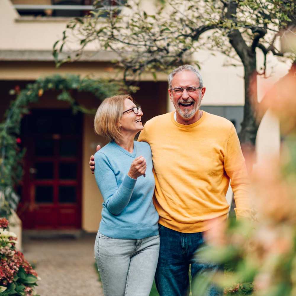 Resident couple walking over the street near Whitetail Ridge in Salem, Wisconsin