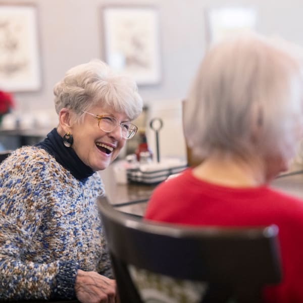 residents smiling together at The Castlewood Senior Living in Nixa, Missouri