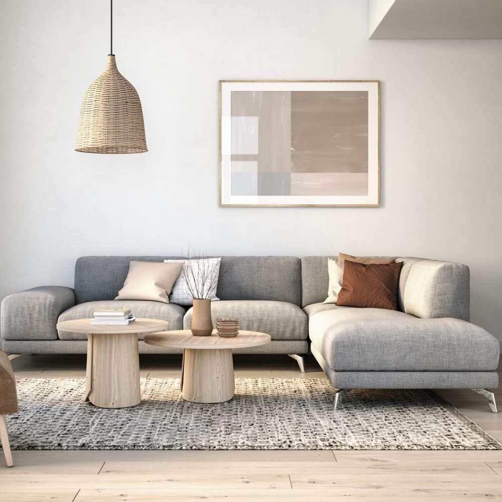 Living room with a couch, table and hard-wood floor at Indian Terrace I Apartments in Auburn, Indiana