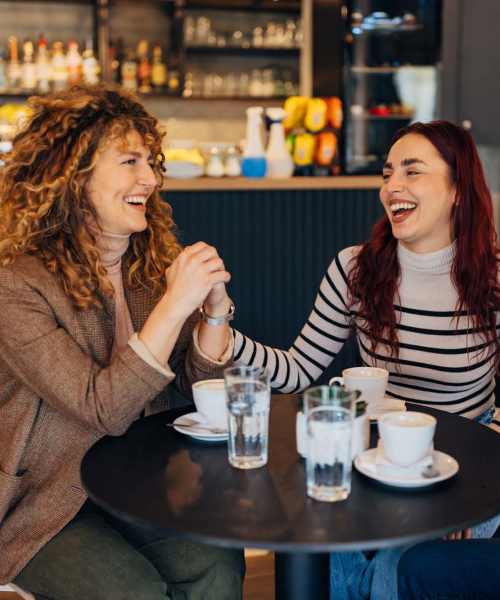 Friends having coffee at a cafe near 30 Metro in Omaha, Nebraska