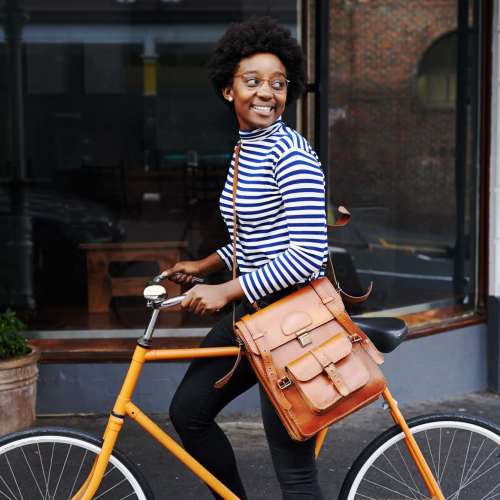 Woman biking to work near Foundry on Fifth in Renton, Washington