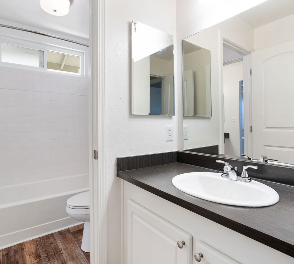 Spacious bathroom with an oval tub at Ridgecrest Apartment Homes in Martinez, California