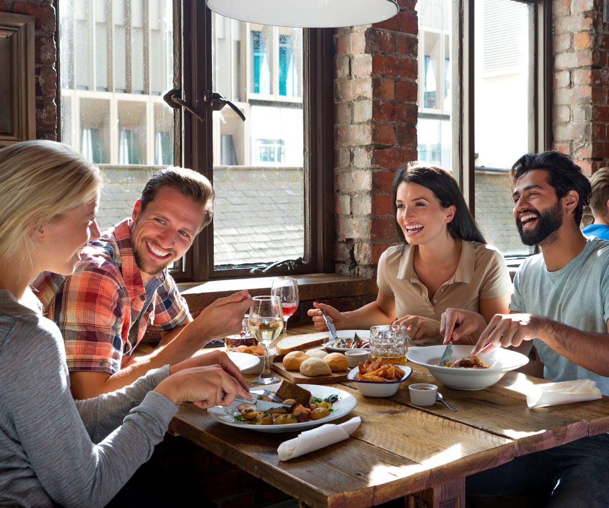 Friends enjoying lunch near The Courtyards in Tulsa, Oklahoma