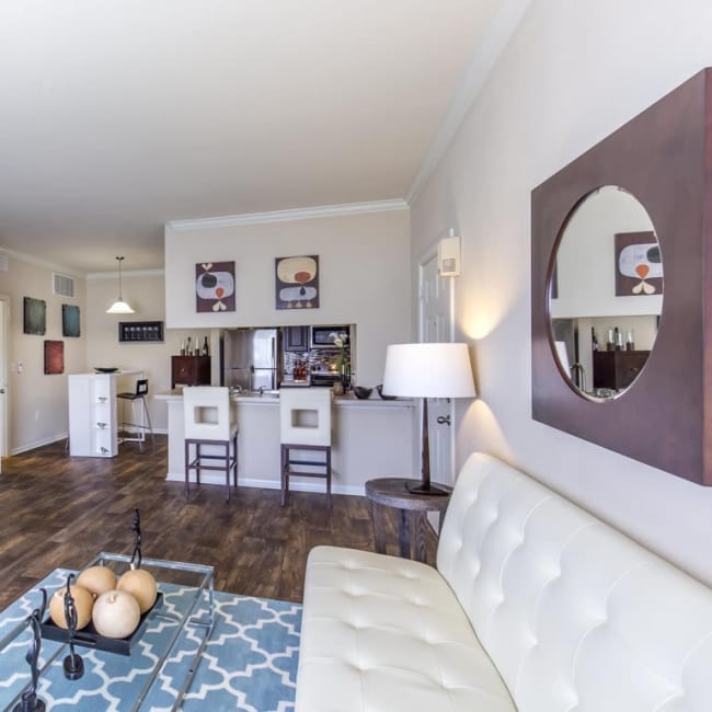 Well-decorated living room in model home at Ranch at Hudson Xing in McKinney, Texas