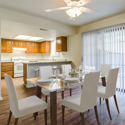 A well lit dining room in a home at Carl Vinson Park in Lemoore, California
