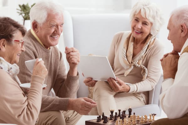 senior living residents playing games together and having fun in michigan city indiana