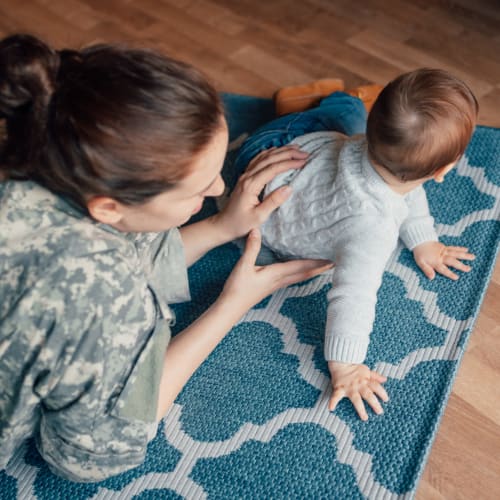 A mother and her son in a home at Castle Acres in Norfolk, Virginia