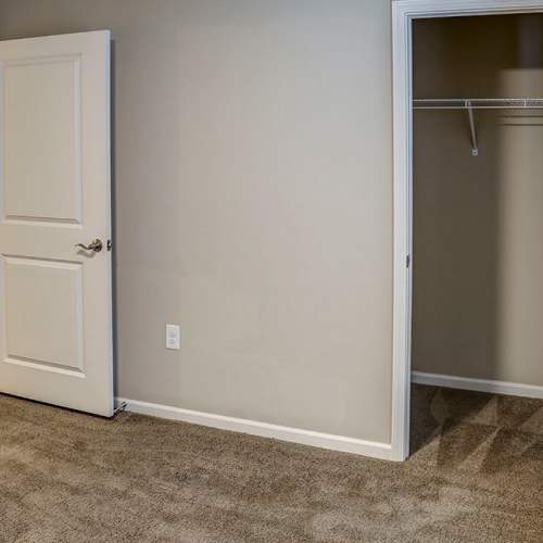 Bedroom with a walk-in closet at Brea's Crossing Senior Living I in Shelbyville, Kentucky