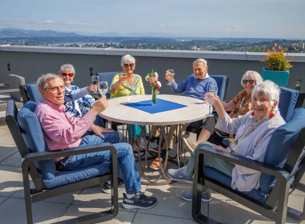 Group of residents at the rooftop deck at Murano in Seattle, Washington