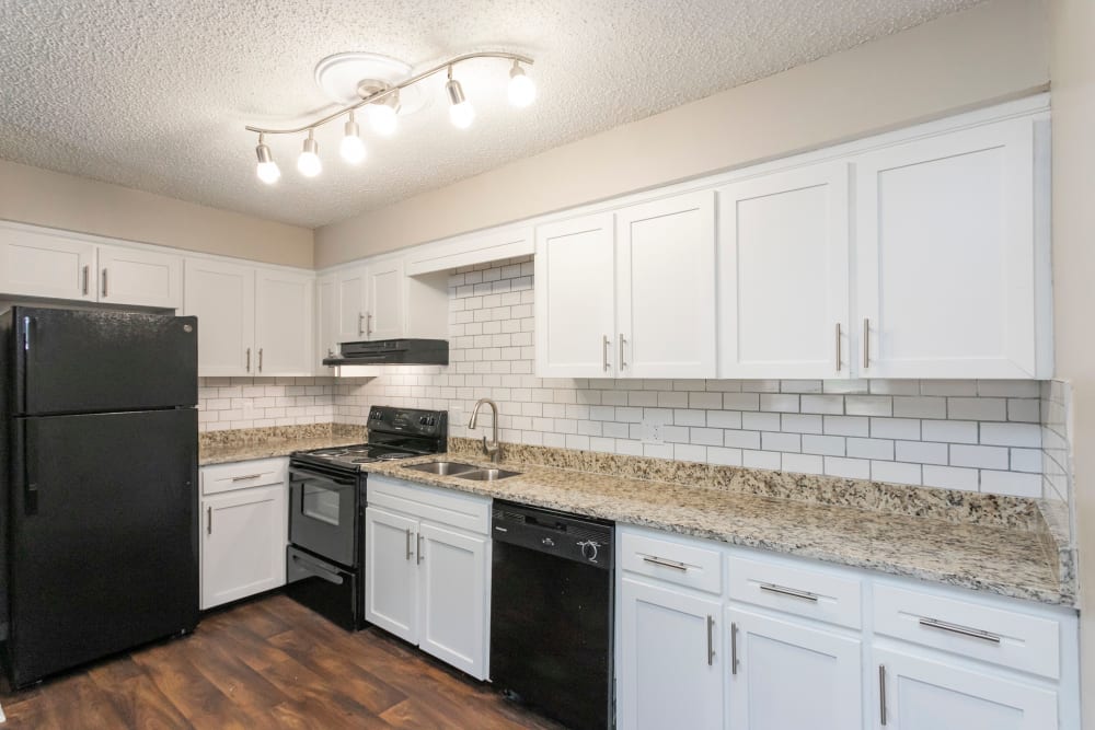 Kitchen with nice hardwood style floors at Parkview Flats Apartments in Murfreesboro, Tennessee