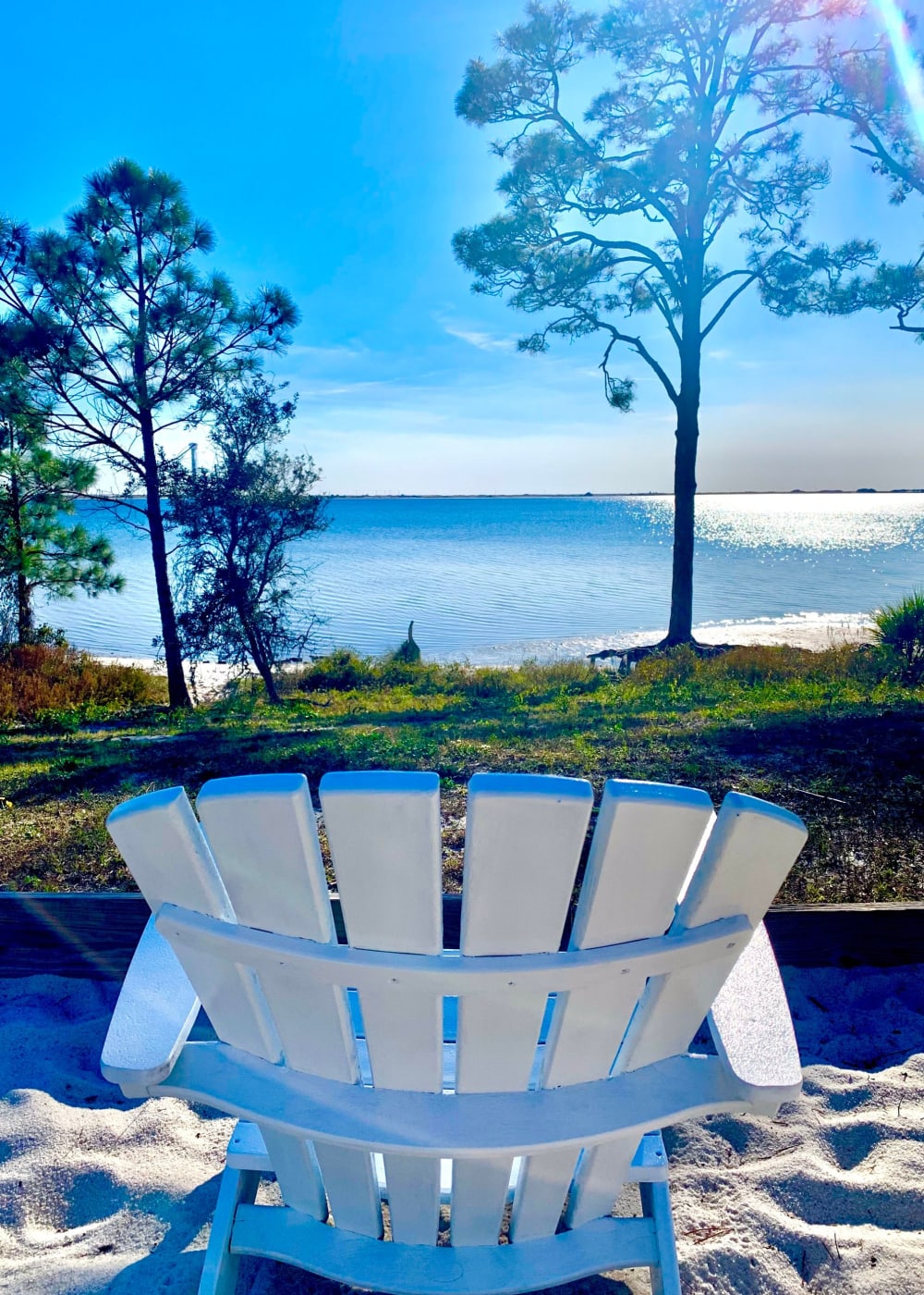 Beachfront Chair in Sand at Emerald Shores in Mary Esther, Florida