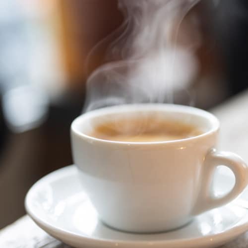 Cup of coffee on the table near Emerald Gardens in Branchland, West Virginia