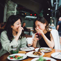 Resident dining at a restaurant near Asheville at Spring Branch in Houston, Texas
