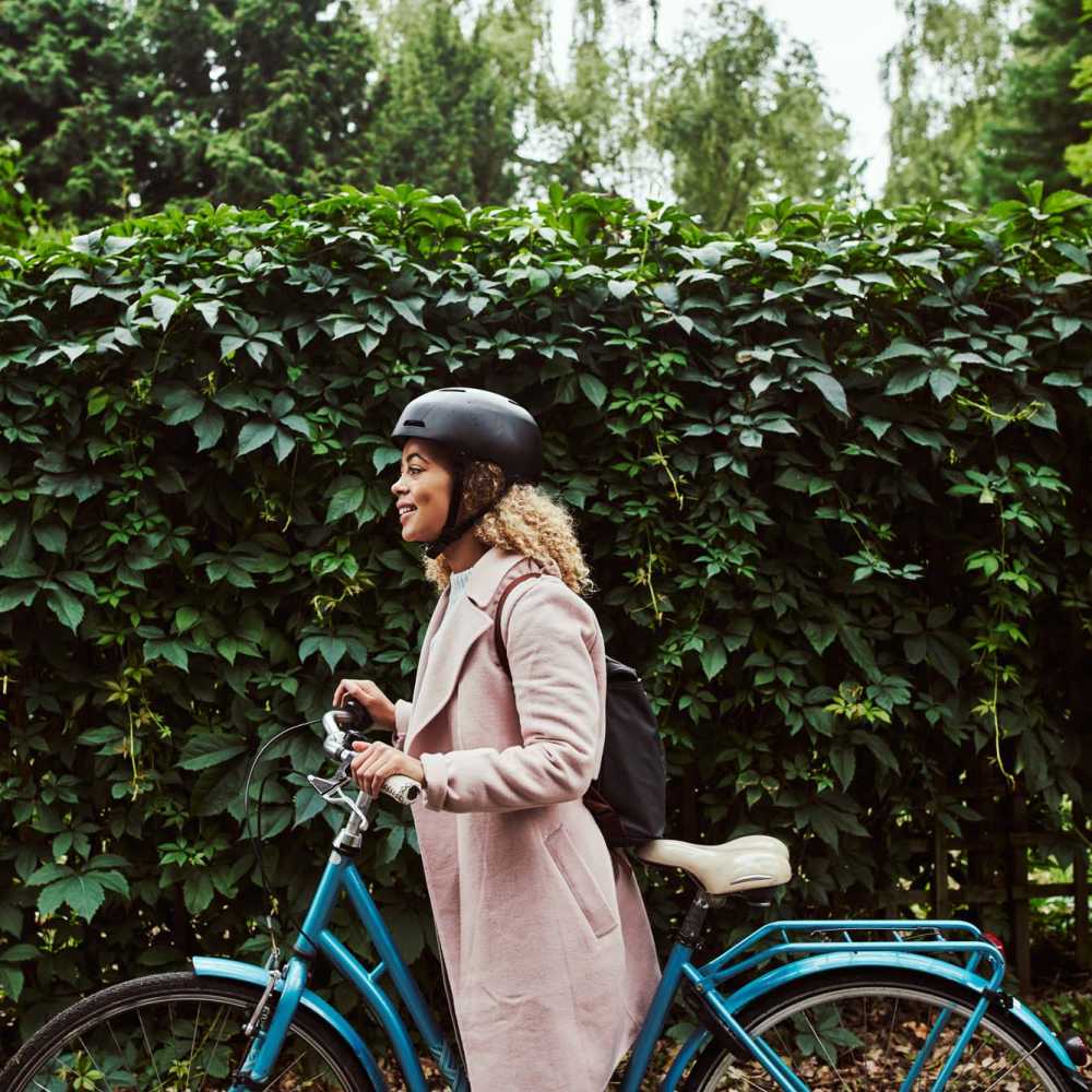 Woman cycling near The Trail Lakes in Fort Worth, Texas