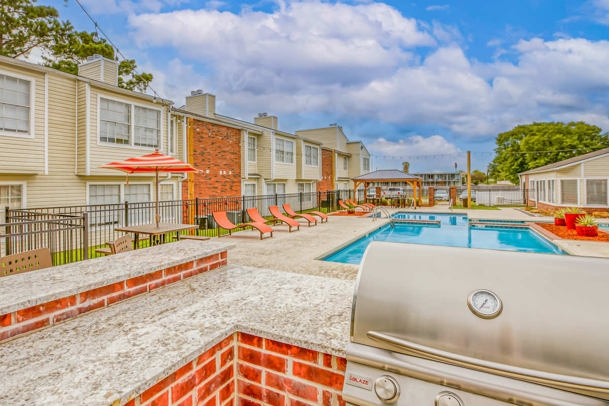 Community grill by pool at Atlas at Lakeview in Baton Rouge, Louisiana