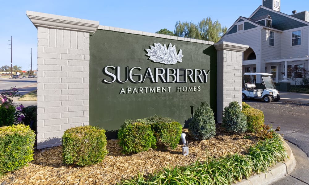 Exterior sign at Sugarberry Apartments in Tulsa, Oklahoma