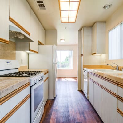 White cabinets in a kitchen at San Onofre III in San Clemente, California