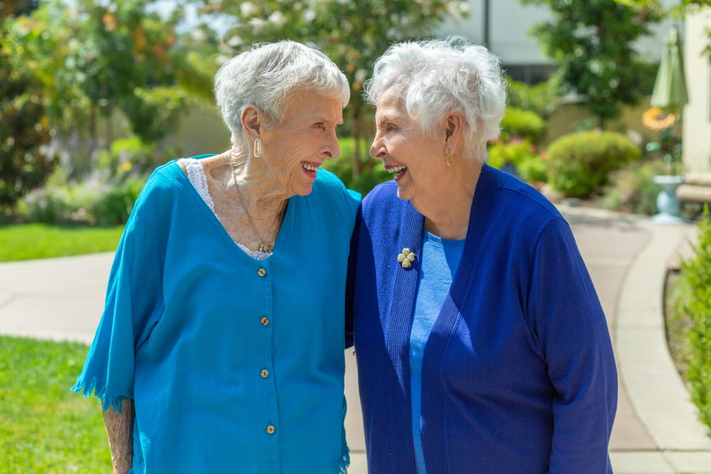 Two Merrill Gardens resident friends out for a walk.