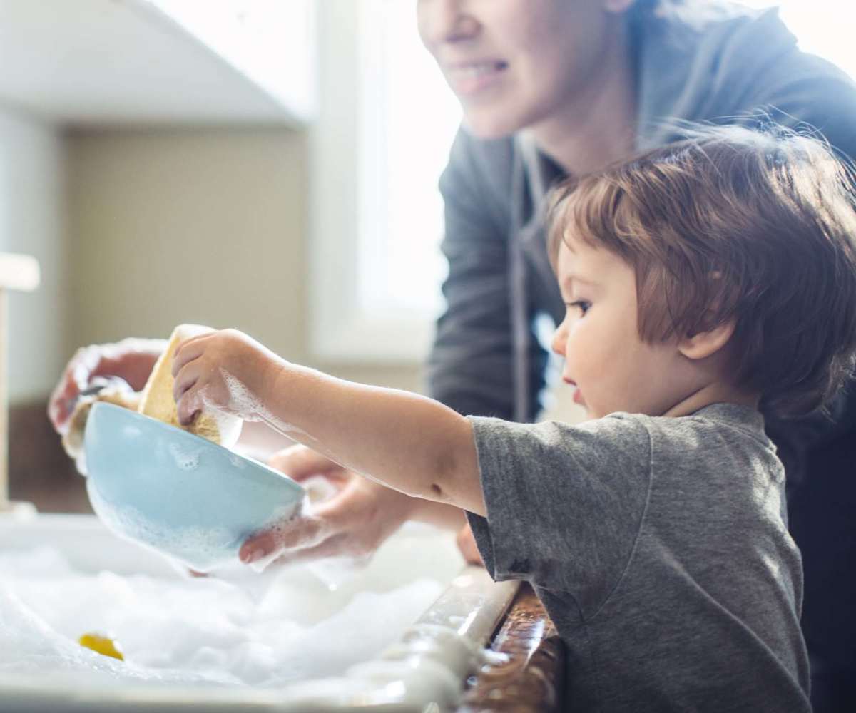 A mother and her child doing the dishes at Millburn in Stow, Ohio