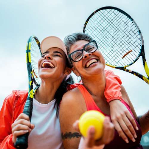 Resients playing tennis near Valley Park Apartments in West Valley City, Utah