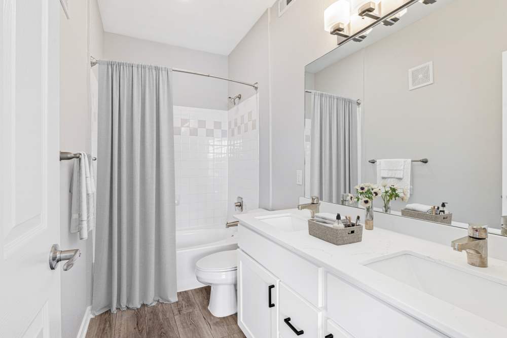 Bathroom with vanity mirror at Photo Gallery | Resort at University Park in Colorado Springs, Colorado