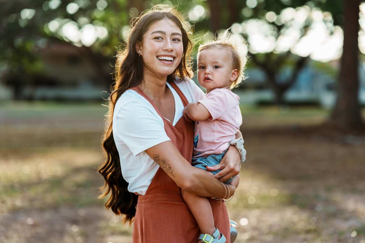Resident with her kid in the park near The Pines of Palos Verdes in Mesquite, Texas