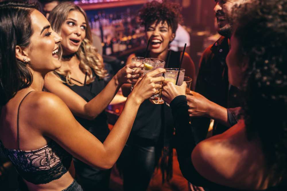 Friends enjoying drinks near CERU in Boca Raton, Florida