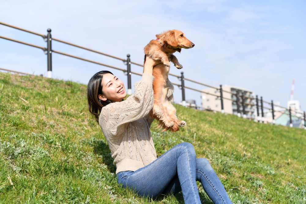 A resident and her dog at CERU in Boca Raton, Florida