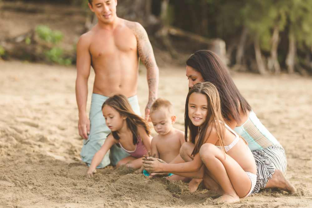 Family enjoying nature near Pa'anau Village I in Koloa, Hawaii