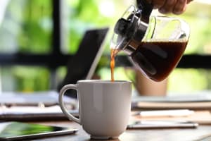 Pouring a cup of coffee at Hawthorne Apartments in Palo Alto, California