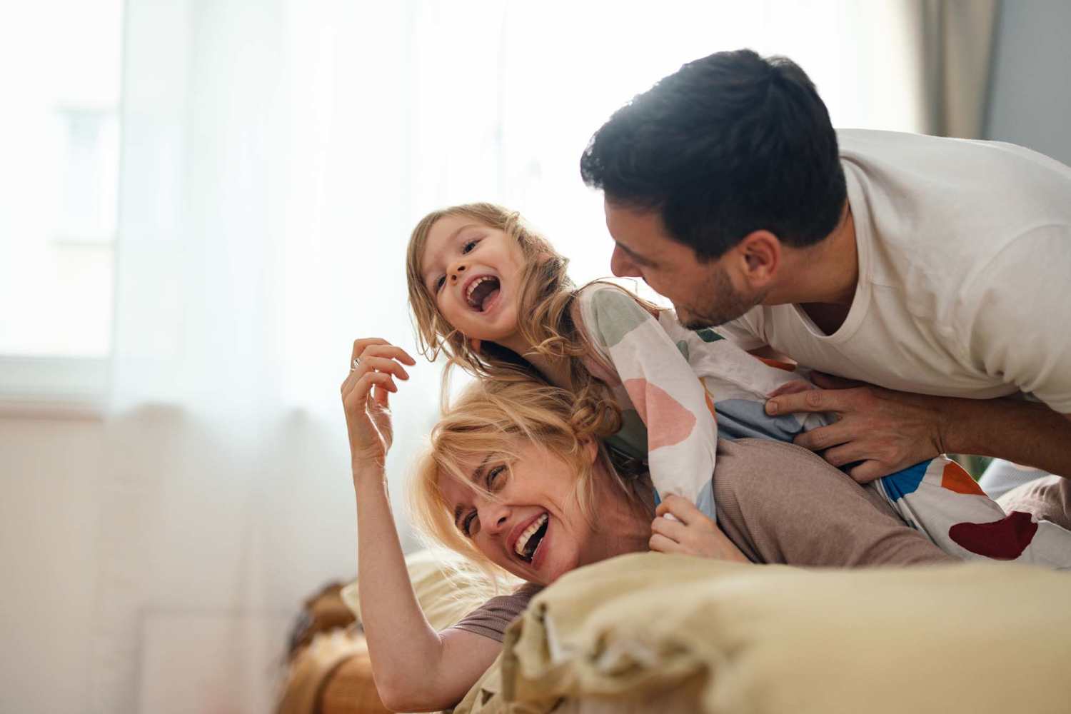 A happy family sharing their laughs at Stonegate Square in Midlothian, Texas