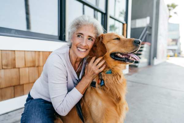 Resident with her dog at Hershey Plaza Apartments in Hershey, Pennsylvania