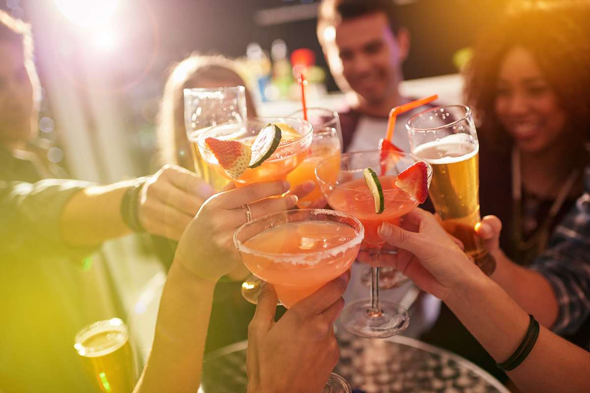 Friends raising a toast to the good life at Westwood Apartments in West Des Moines, Iowa
