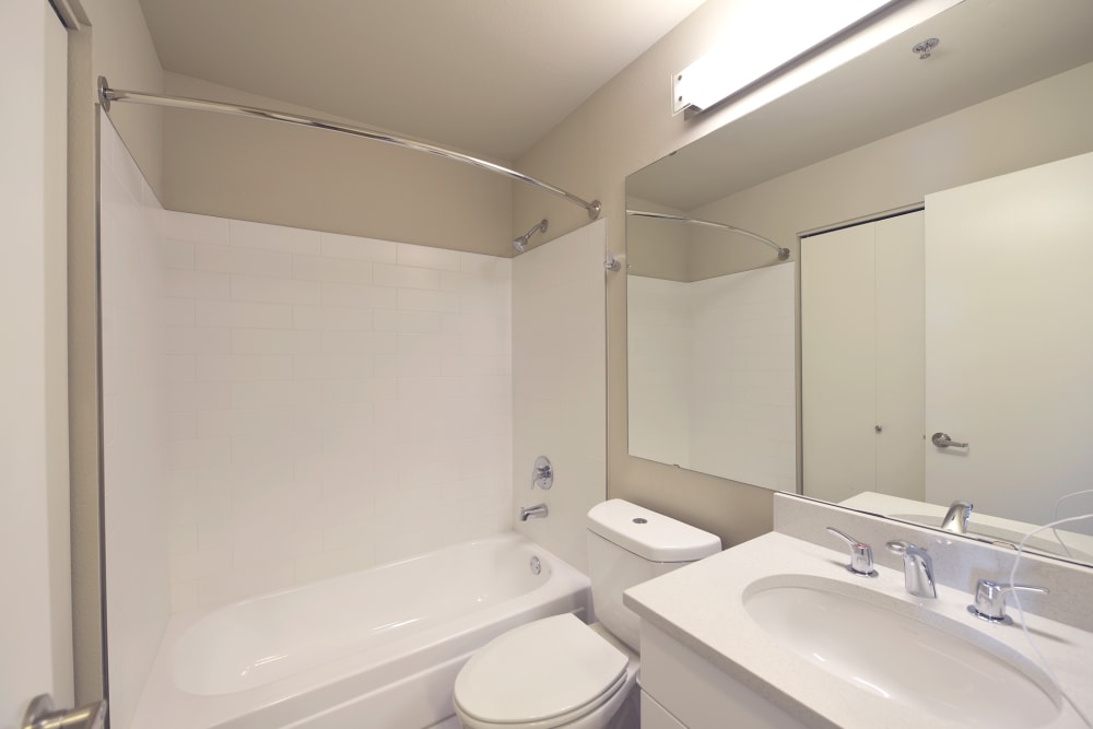 Bathroom with white countertop at 2900 on First Apartments in Seattle, Washington