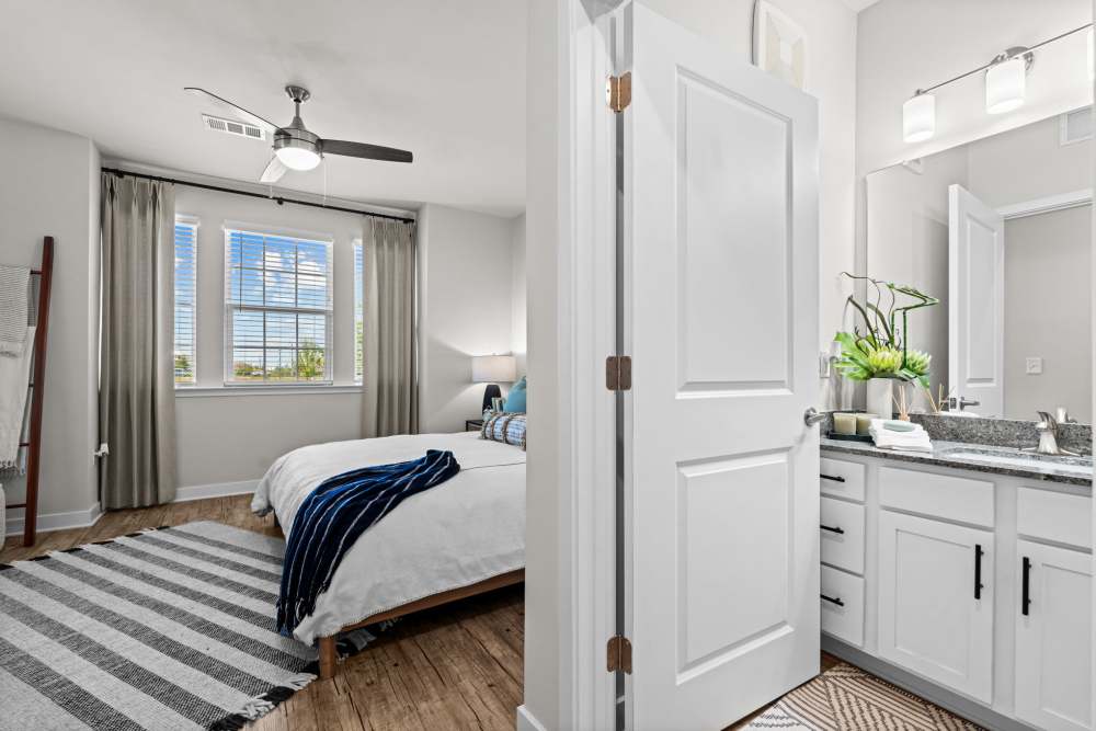 Apartment bedroom with attached bathroom at Mexico Beach Crossings in Mexico Beach, Florida