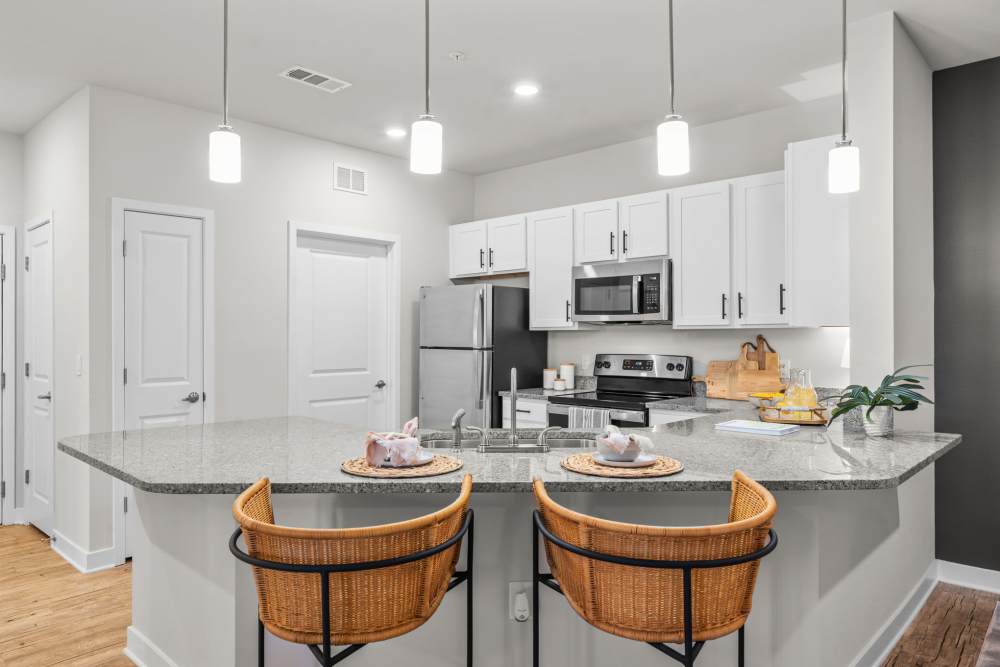 Granite countertop with barstools at Mexico Beach Crossings in Mexico Beach, Florida