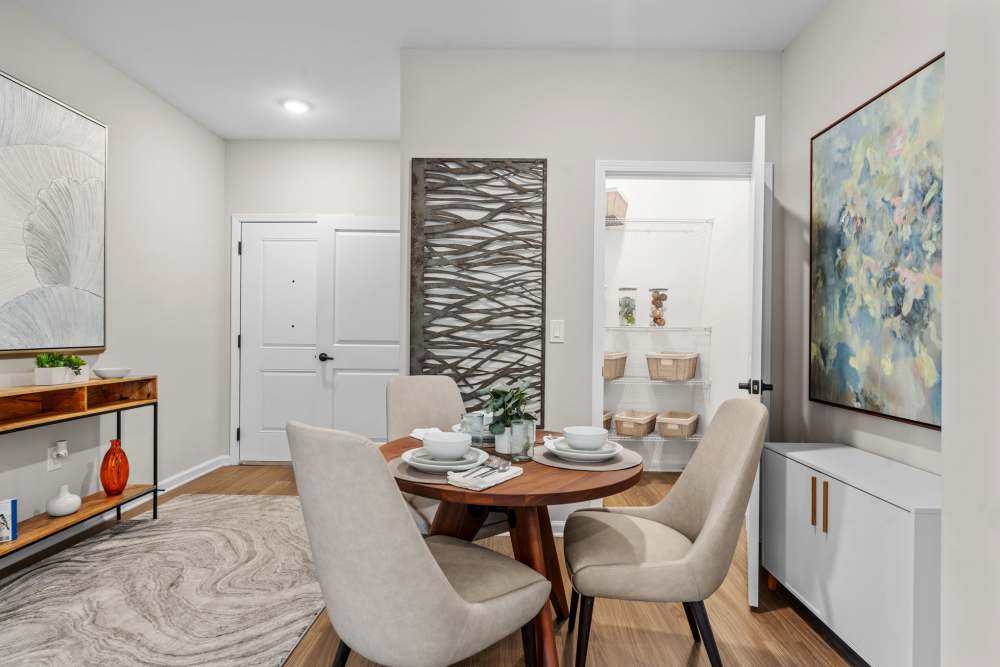 Apartment with unique flooring style and island kitchen in the background at North Bay Landing in Panama City,Florida