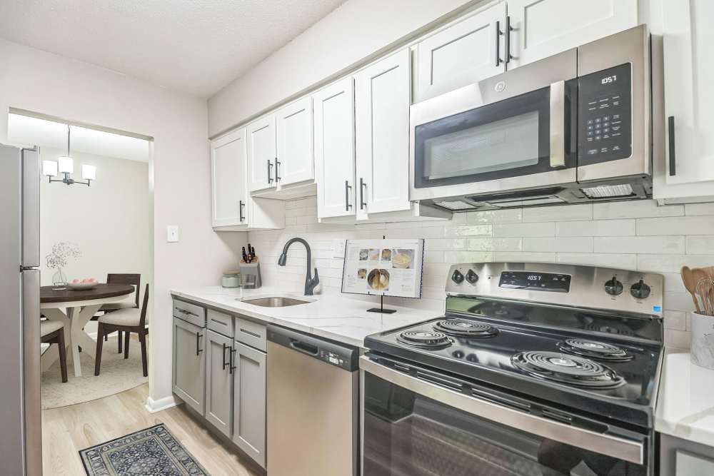 Two-toned cabinet renovation in the kitchen at Ramblewood Village Apartments in Mount Laurel, New Jersey