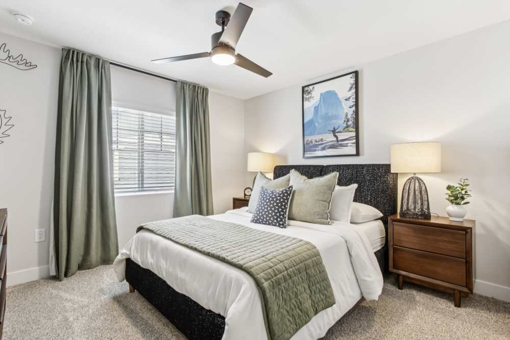 Apartment bedroom with ceiling fan at BB Living Colliers Hill in Erie, Colorado