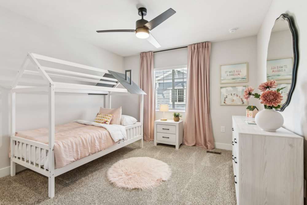Apartment bedroom with comfortable bed at BB Living Colliers Hill in Erie, Colorado