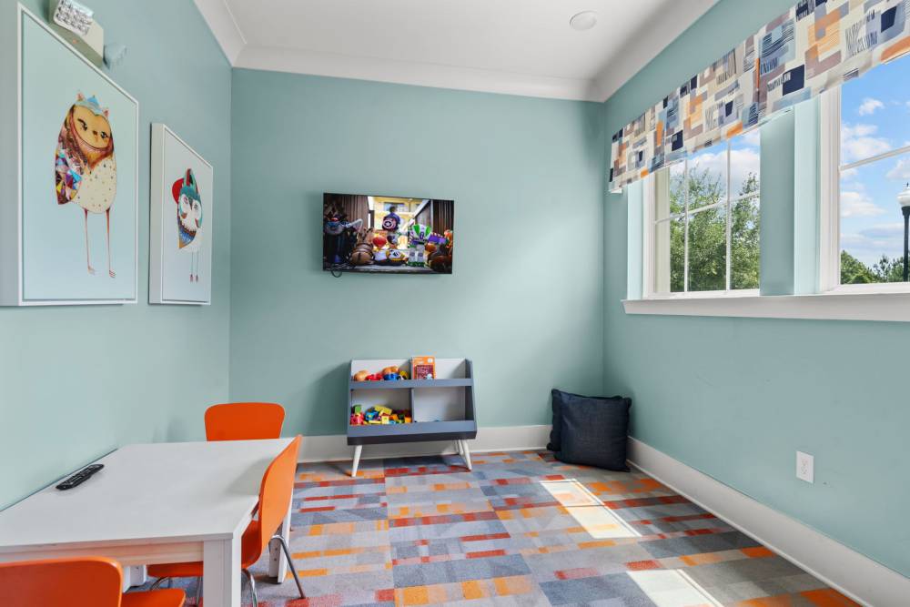Playroom in fitness center at Pier Park Crossings Apartments.