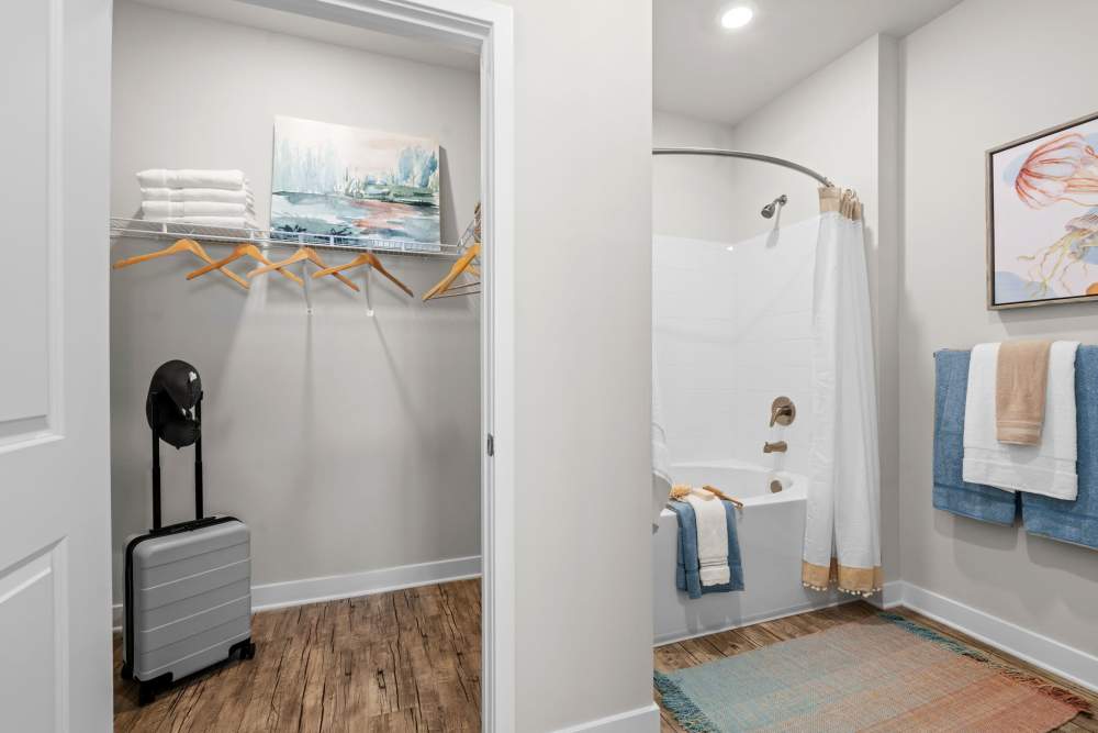 Primary bathroom with walk in closet at Mexico Beach Crossings Apartments.