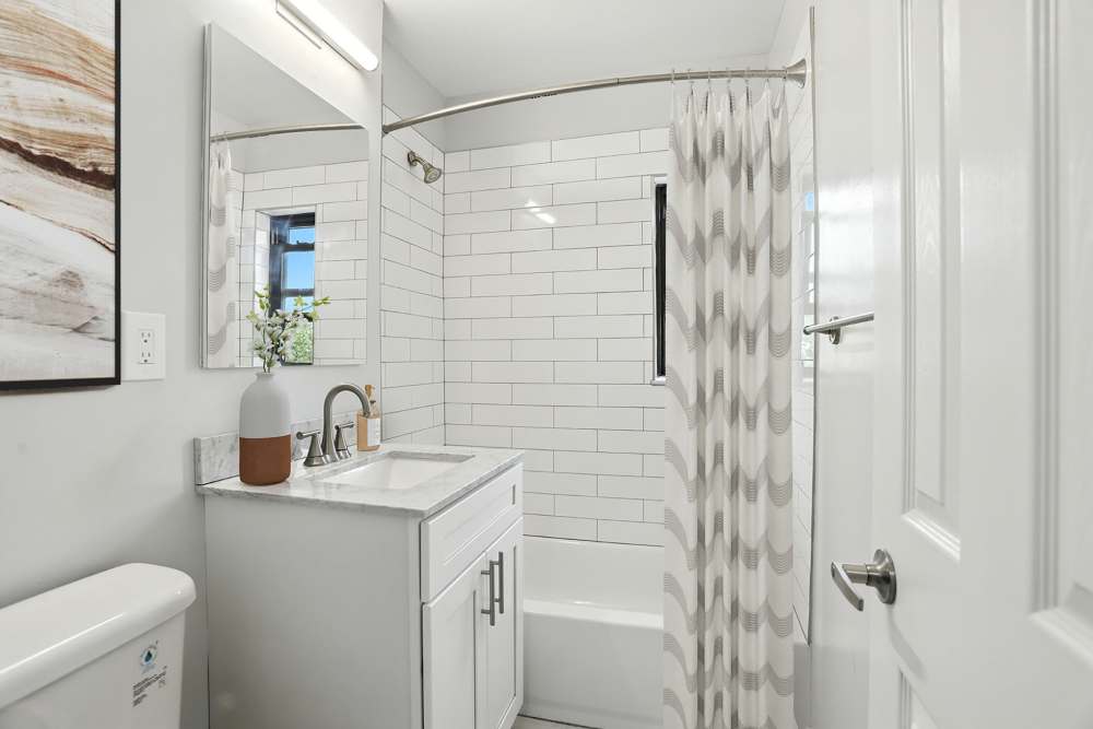 Renovated bathroom at Eagle Rock Apartments at Hicksville/Jericho in Hicksville, New York