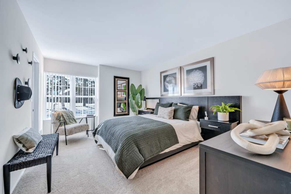 Model bedroom with a walk-in closet at Muirwood in Farmington Hills, Michigan