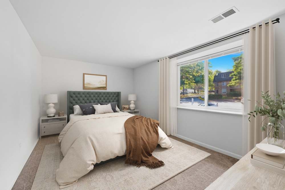 Spacious bedroom with natural light at Fairway Apartments in Reston, Virginia