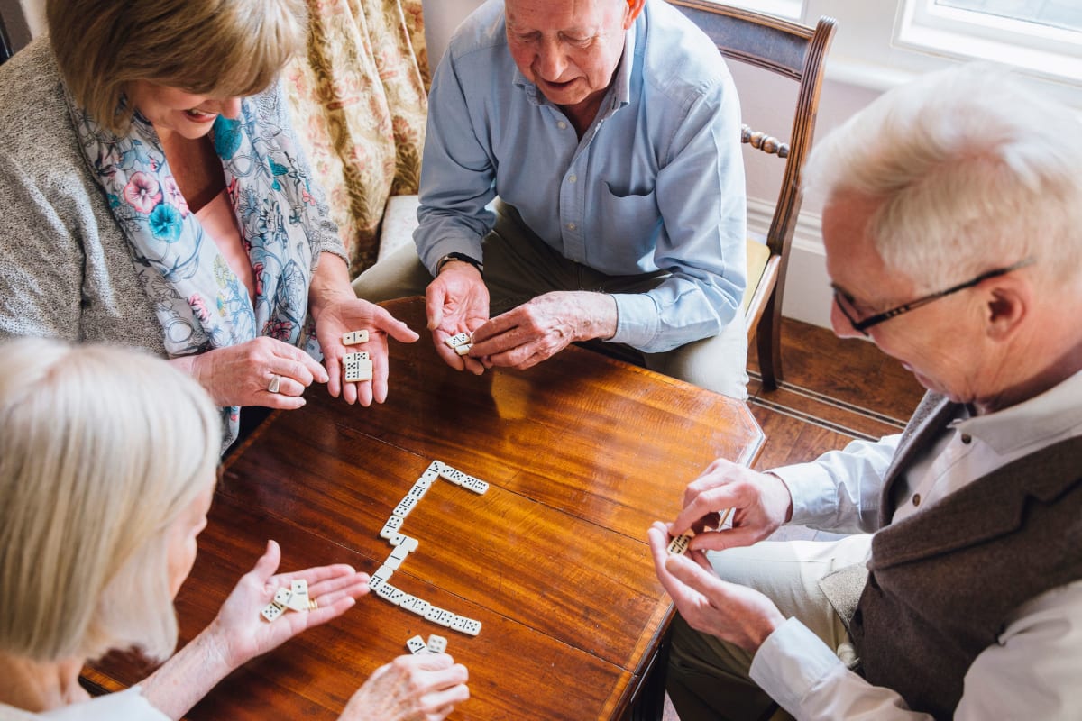 Residents playing a game together at The Oxford Grand Assisted Living & Memory Care in Wichita, Kansas