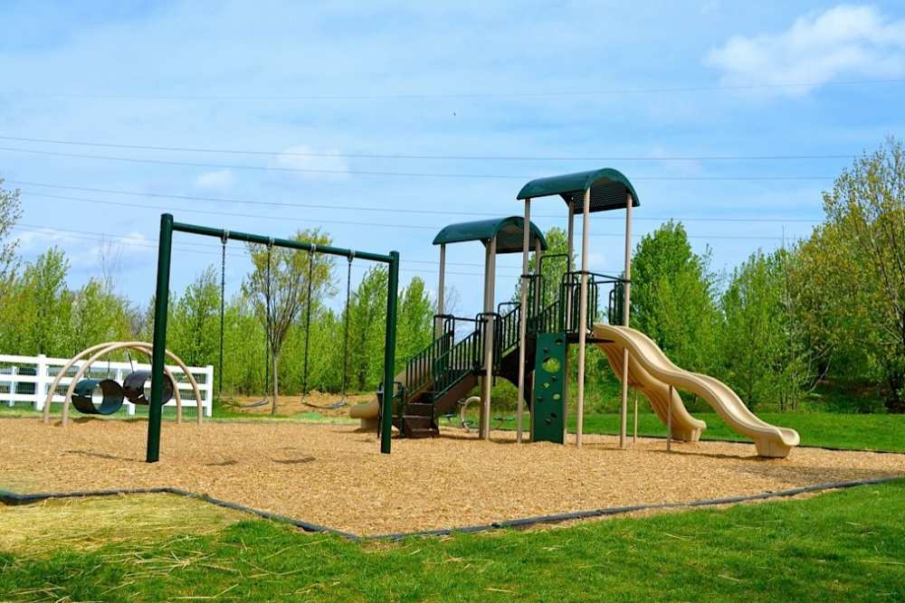 Outdoor playground at Paddock Club Apartments in Florence, Kentucky