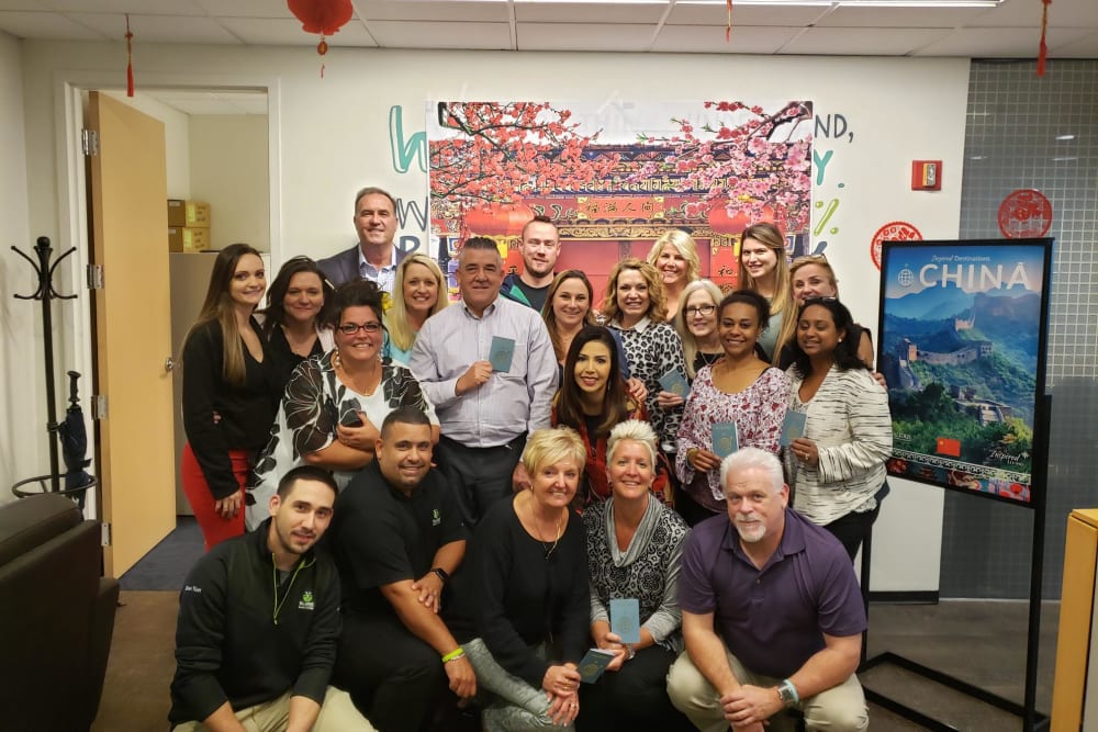 Group picture of the Inspired Destinations staff at Inspired Living Sarasota in Sarasota, Florida.