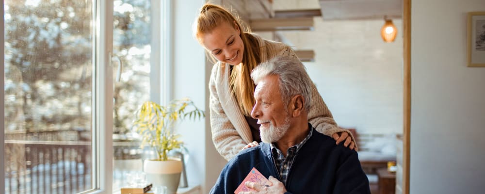 A volunteer helping a resident at Edgemont Place in Blaine, Minnesota