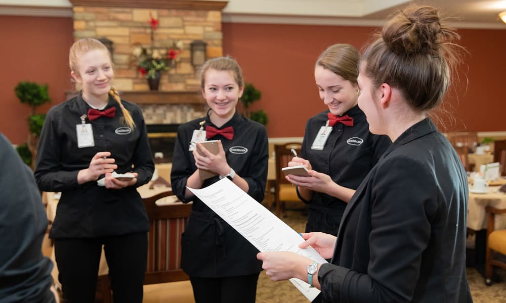 A group of dining servers at Touchmark on West Prospect in Appleton, Wisconsin